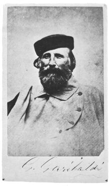 Portrait photograph of Giuseppe Garibaldi wearing a cap.