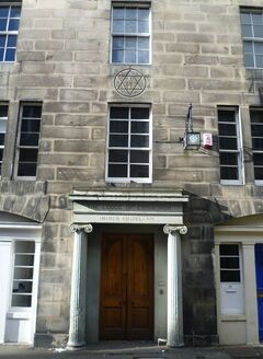 The stone façade and doorway of the Lodge of Edinburgh at Hill Street.